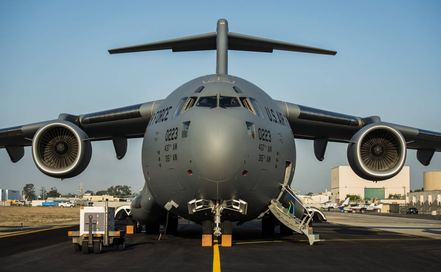 The final U.S. Air Force C-17A Globemaster III, P-223, is rolled off the Boeing assembly line and placed on the flight line during a ceremony celebrating 20 years of delivering C-17s to the U.S. Air Force, on September 12, 2013, at Long Beach, California. <em>U.S. Air Force photo/ Senior Airman Dennis Sloan</em>
