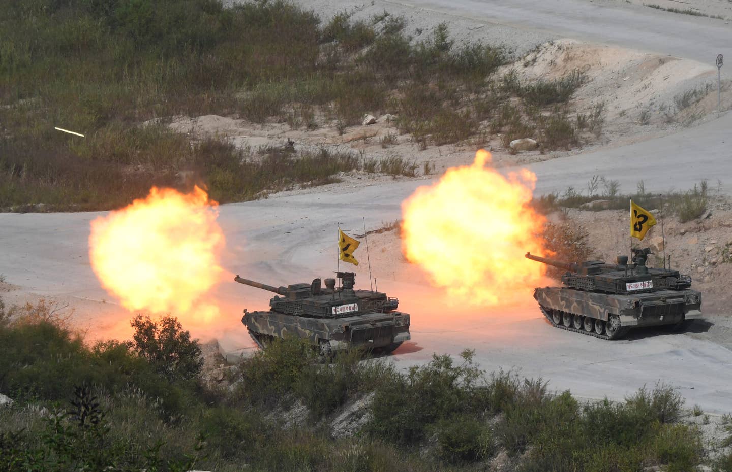 South Korean K2 tanks during a live fire demonstration for a media preview of the Defense Expo Korea 2018 at Seungjin Fire Training Field in Pocheon, 65 km northeast of Seoul, Sept. 11, 2018. (JUNG YEON-JE/AFP via Getty Images)