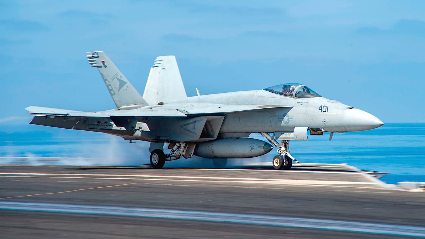 A US Navy F/A-18E Super Hornet launches from the deck of the supercarrier USS Harry S. Truman in May 2022.