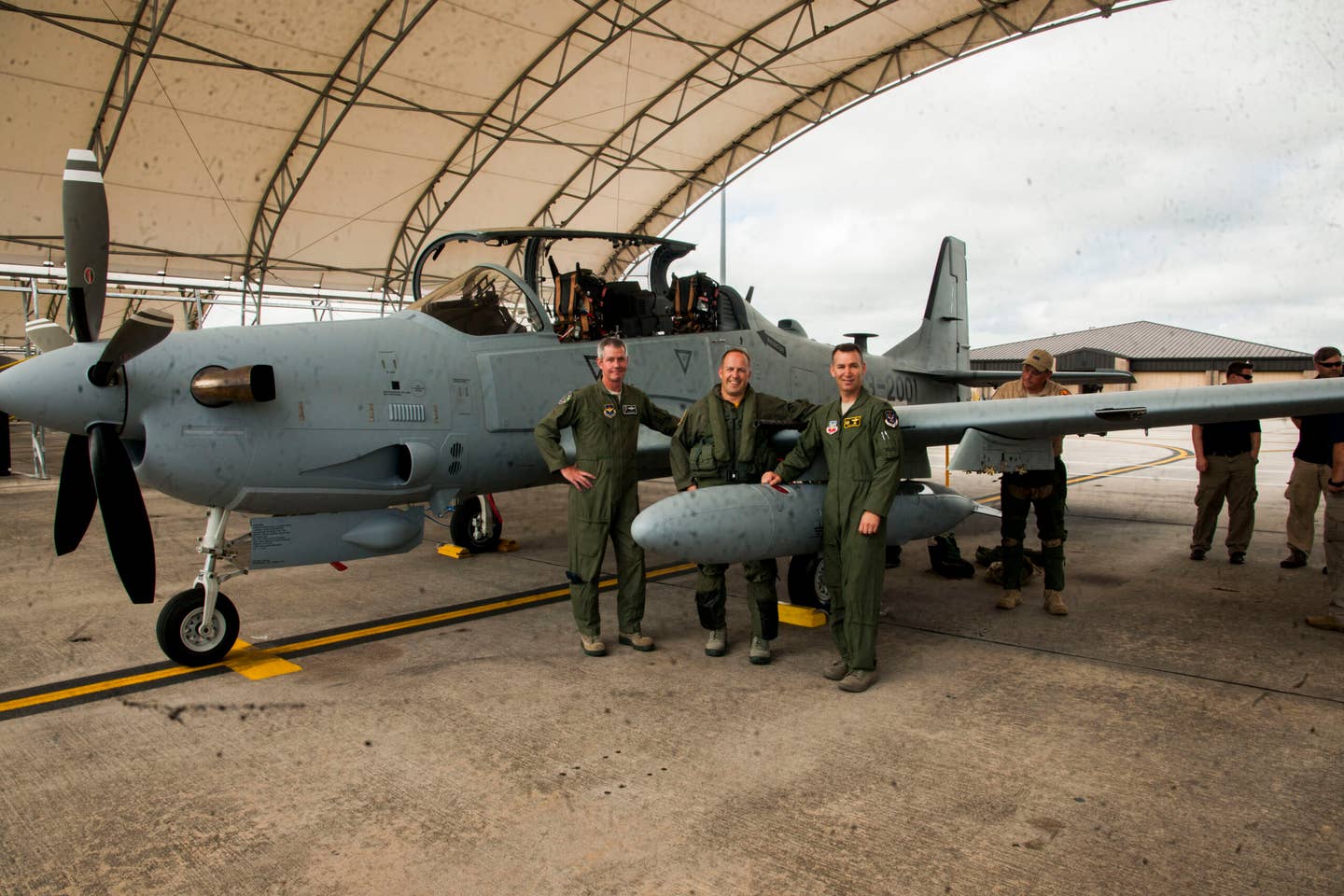A group photo after the arrival of the first A-29 for the Afghan A-29 Light Air Support training mission at Moody Air Force Base, Georgia, in September 2014. <em>U.S. Air Force photo/Airman 1st Class Dillian Bamman</em>