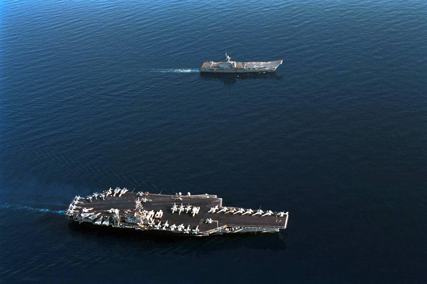 A useful size comparison between the <em>Chakri Naruebet</em> and the aircraft carrier USS <em>Kitty Hawk</em> (CV-63). <em>U.S. Navy</em>