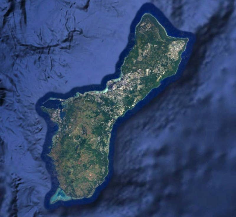 A satellite image of Guam. <em>Google Earth</em>