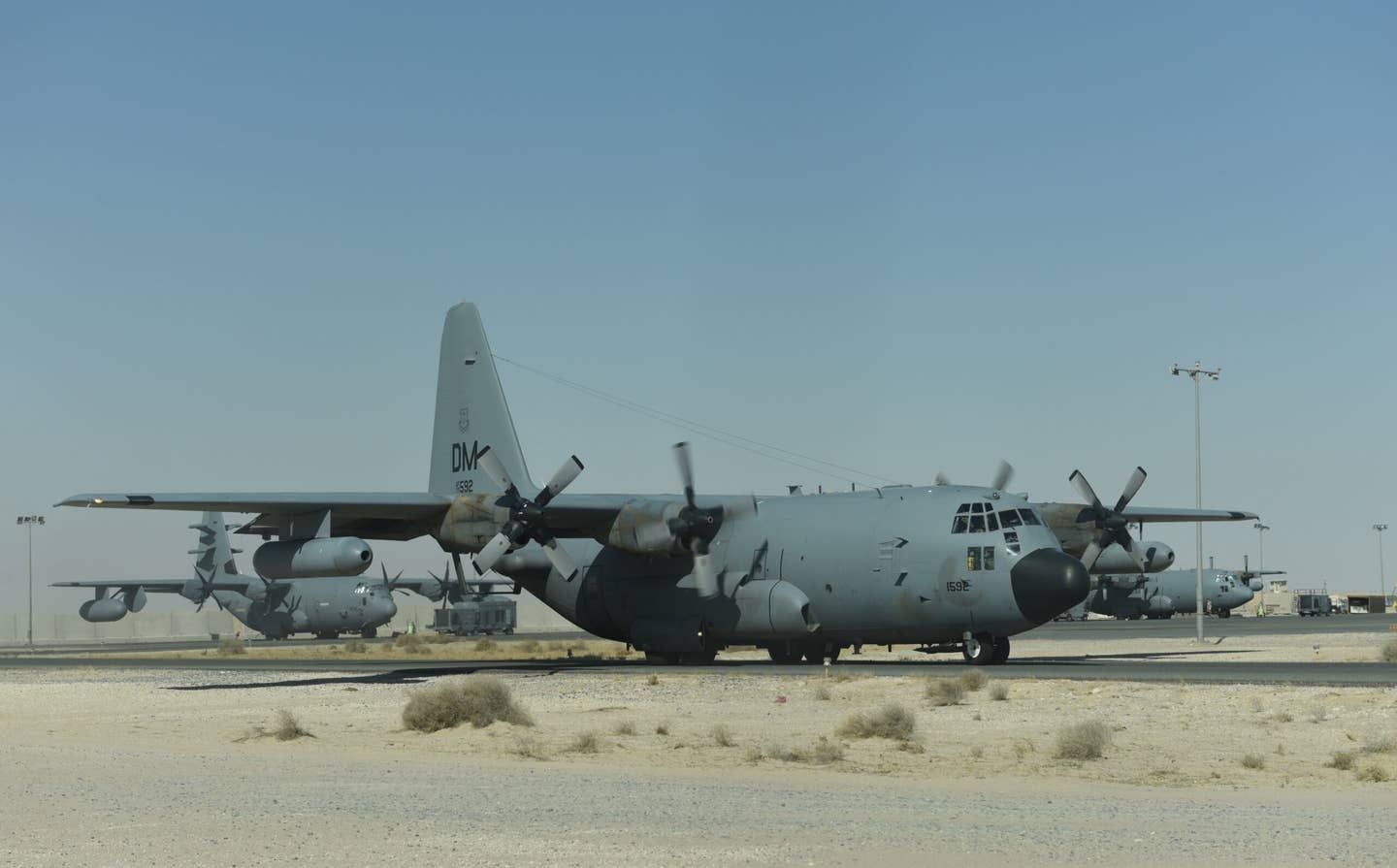 An EC-130H Compass Call travels along the taxiway at an undisclosed location in Southwest Asia, June 27, 2017. <em>Credit: U.S. Air Force</em>
