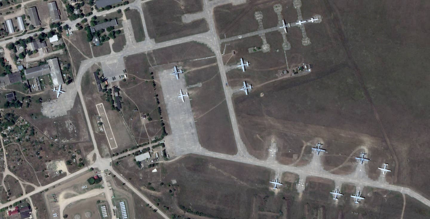 A satellite image of Kacha Air Base taken on July 20 reveals eight Be-12s, seven of which look largely intact, as well as what appear to be a pair of fuselages. <em>PHOTO © 2022 PLANET LABS INC. ALL RIGHTS RESERVED. REPRINTED BY PERMISSION</em>