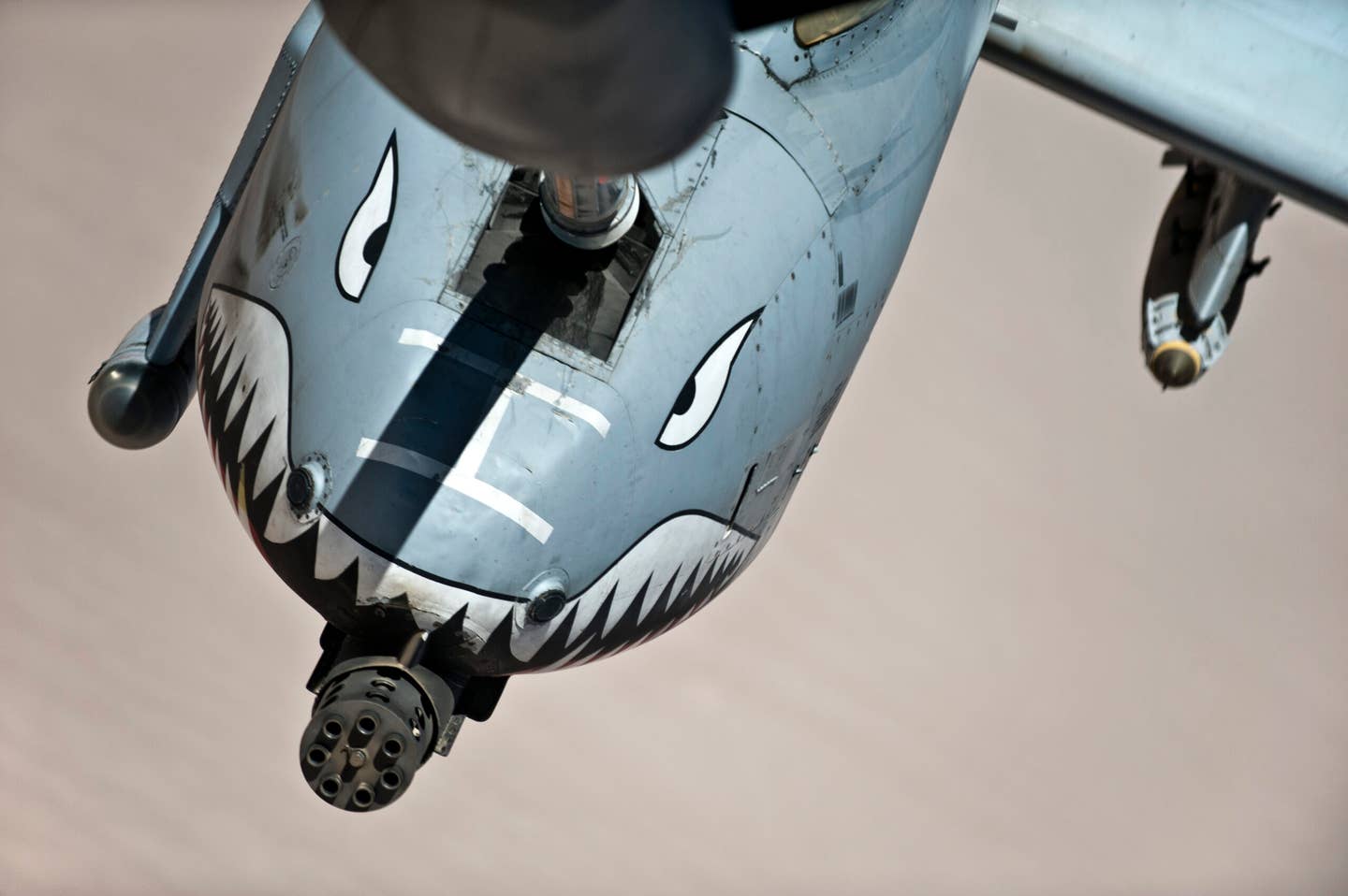 An A-10 Thunderbolt II is refueled over Southern Afghanistan. The most prominent feature of the A-10 Thunderbolt II is the 30-millimeter GAU-8/A Avenger Gatling-gun cannon. <em>Credit: Master Sgt. Jeffrey Allen/U.S. Air Force</em>