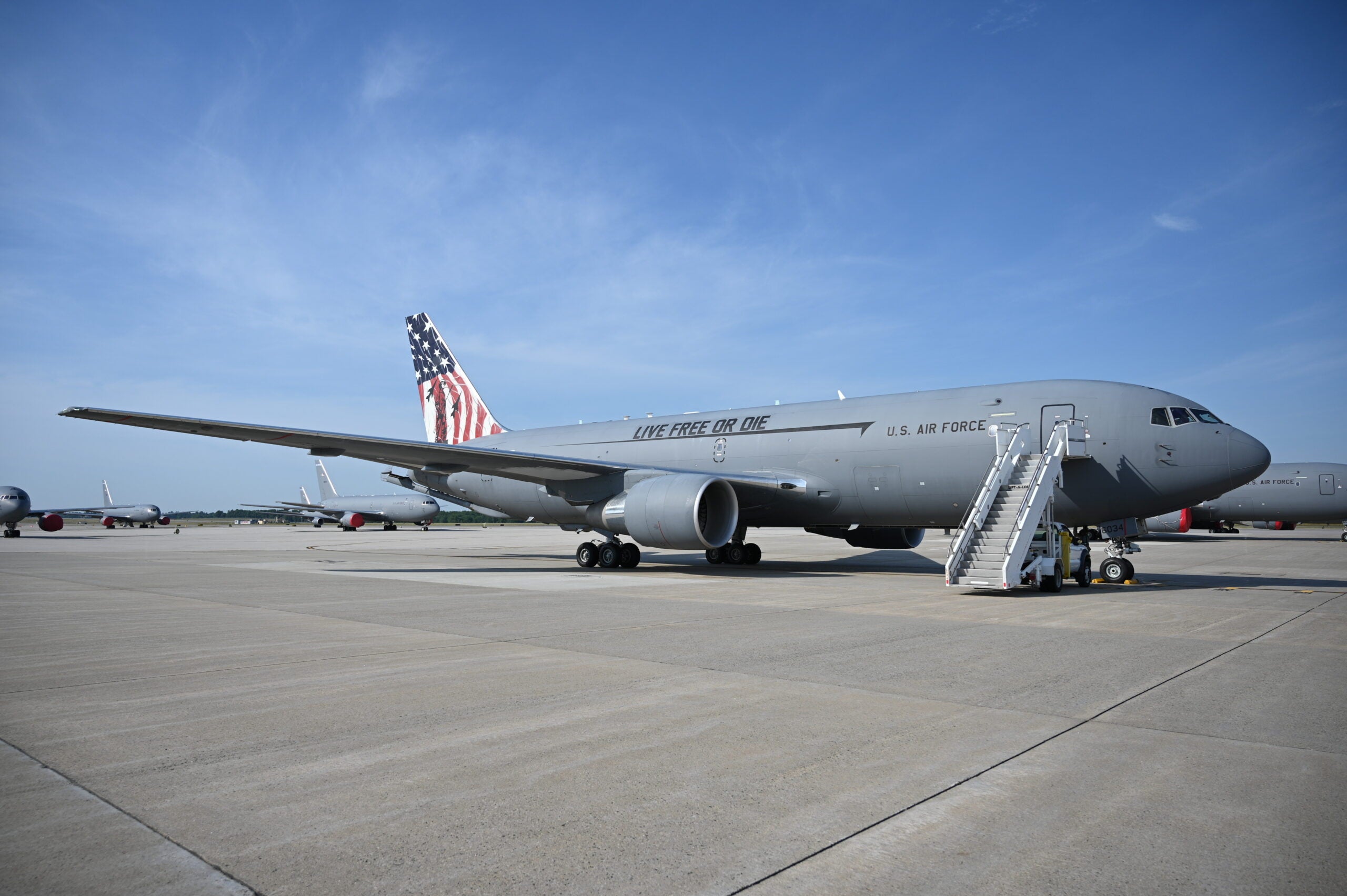 A KC-46A Pegasus, dubbed the Spirit of Portsmouth and emblazoned with a colorful new paint job, touches down at Pease Air National Guard Base New Hampshire, July 1, 2022. The paint job was crafted to honor both the 75th anniversary of the U.S. Air Force and the 400th anniversary of the founding of Portsmouth, showcasing  the wing's National Guard heritage and rich history in the state of New Hampshire. (U.S. Air National Guard photo by Staff Sgt. Victoria Nelson)
