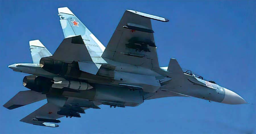 A Russian Su-30SM carrying an IAB-500 practice bomb that simulates a nuclear detonation. <em>via Twitter</em>