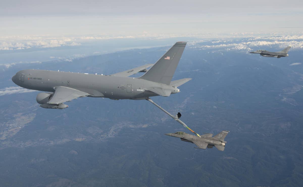 N462KC conducts the first ever aerial refueling by a KC-46A in 2016. <em>Boeing/Paul Weatherman</em>