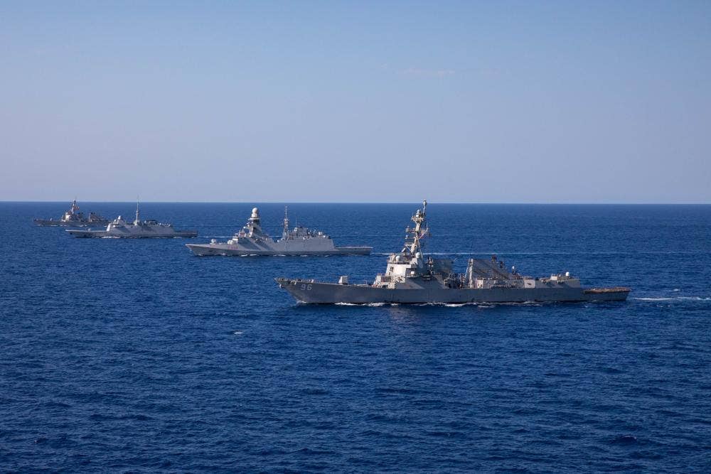 From front, the <em>Arleigh Burke</em>-class guided-missile destroyer USS <em>Bainbridge</em> (DDG 96), the Italian Navy <em>Carlo Bergamini</em>-class frigate ITS <em>Alpino</em> (F 594), the French Navy <em>Aquitaine</em>-class frigate FS <em>Languedoc</em> (D 653), and the <em>Arleigh Burke</em>-class guided-missile destroyer USS <em>Cole</em> (DDG 67), transit during a maneuvering exercise in the Adriatic Sea, July 6, 2022. <em>USN</em>