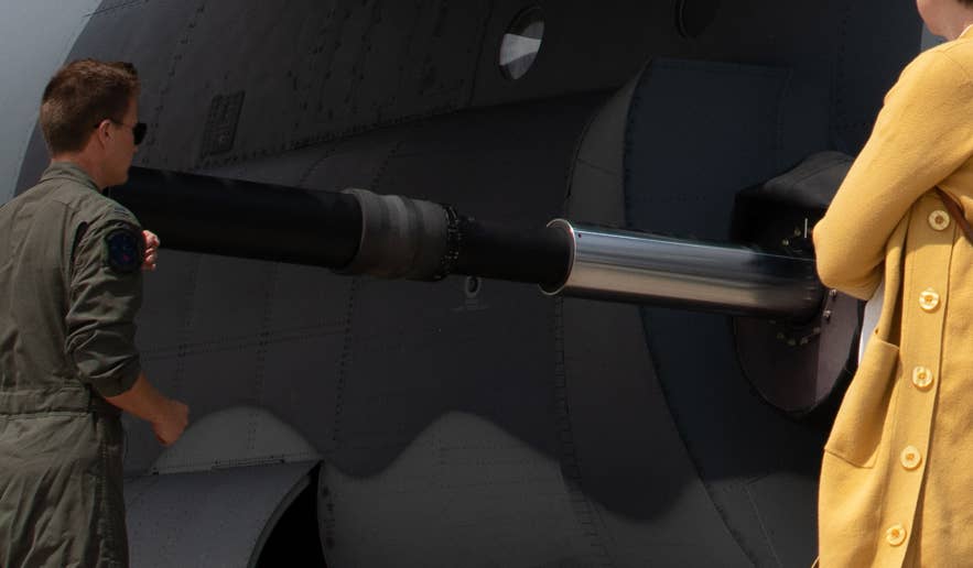 A close-up image of the AC-130J's howitzer. A flash hider has been attached to the end of the barrel. <em>USAF</em>