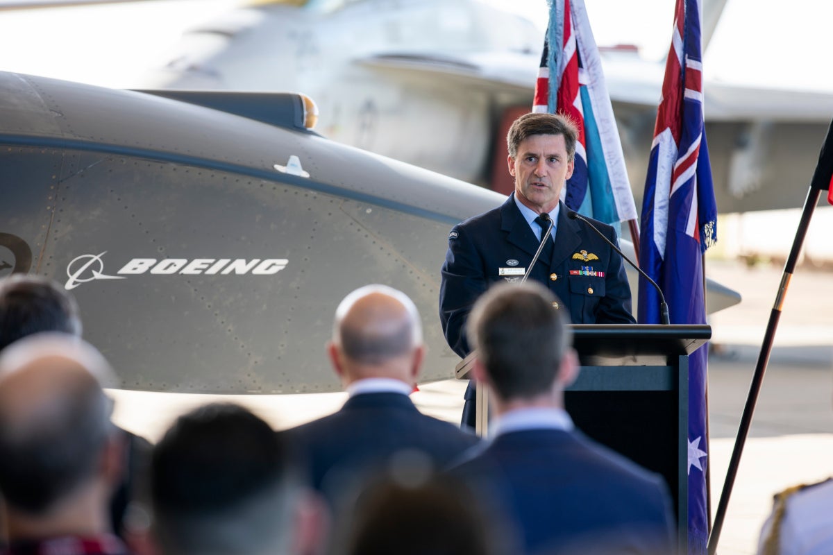 Head of Air Force Capability, Air Vice-Marshal Robert Denney, AM, addresses the audience at a Boeing Airpower Teaming System naming ceremony at RAAF Base Amberley, Queensland. *** Local Caption *** The official name of the first Australian made Airpower Teaming System aircraft has been announced as MQ-28A Ghost Bat. The announcement was made at RAAF Base Amberley, QLD, on 21 March 2022, by the Minister for Defence, the Honourable Peter Dutton MP.

The Minister for Defence was joined by senior Air Force members, as well as Boeing Australia officials, at the event for the naming of the MQ-28A Ghost Bat; which is the first military aircraft designed and built in Australia in more than 50 years.
             
Aircraft names are made up of two elements including a military designator and also a popular name. On 18 February 2022, the United States Air Force Systems Integration Branch confirmed the aircraft will be assigned the military designation MQ-28A.
                
The popular name, Ghost Bat, was approved by the Chief of Air Force, Air Marshal Mel Hupfeld, following a naming competition open to Air Force members and Air Force cadets.