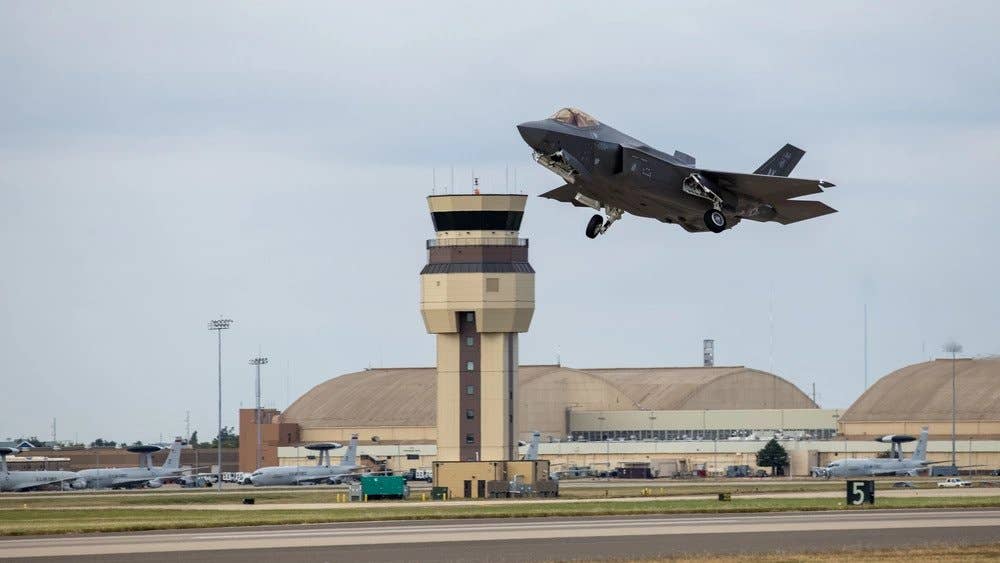 With the Tinker control tower in the background, an F-35 Lightning II aircraft takes off at Tinker Air Force Base, Oklahoma, Oct. 22, 2021. (U.S. Air Force photo by Paul Shirk)