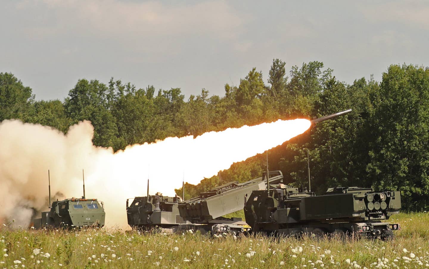 U.S. Army HIMARS fire rockets at Fort Drum, New York, in August. <em>U.S. Army Photo by Sgt. 1st Class Richard Frost</em>