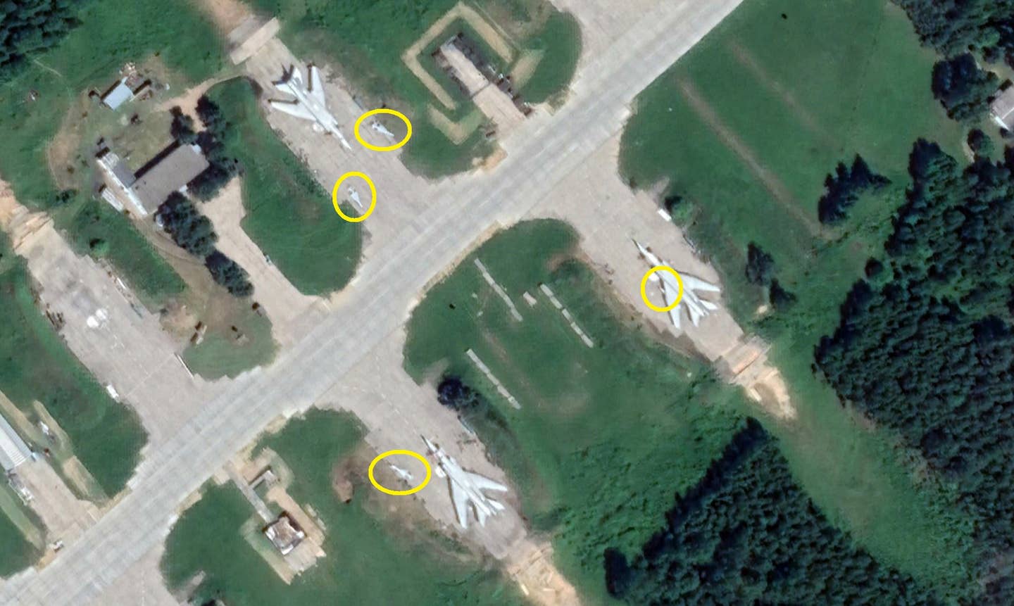 Tu-22M3s are seen with Kh-22 or Kh-32 missiles ready to be loaded, at Shaykovka, in June 2022. <em>Google Earth</em>