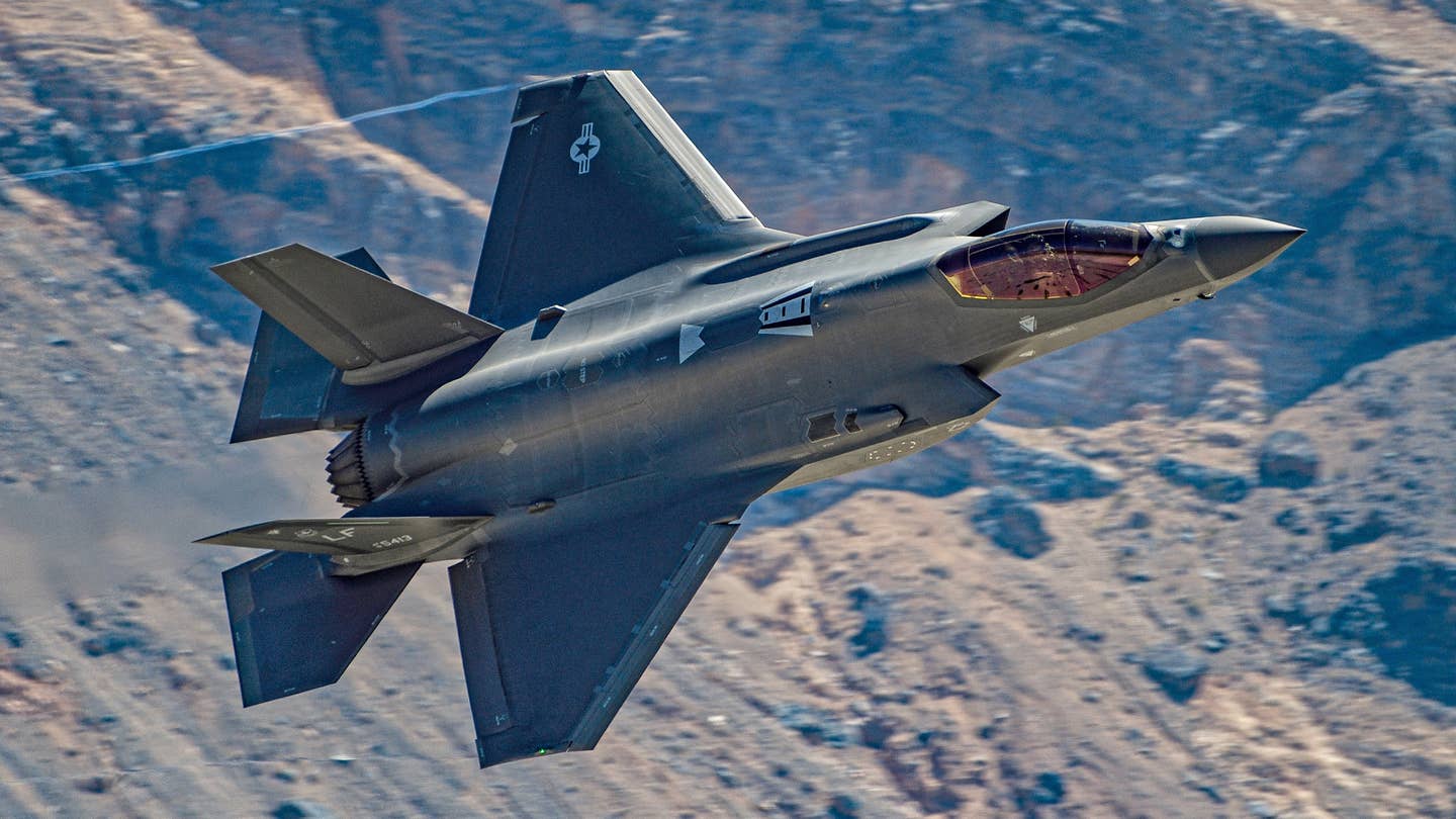 An F-35A of the 56th Fighter Wing from Luke Air Force Base flies at low level. <em>Jamie Hunter</em>