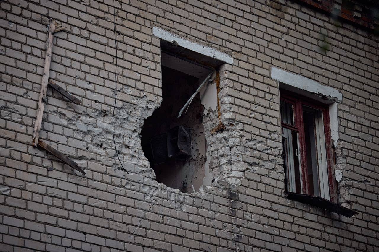 Damage to a wall was observed by Ukrainian troops who recaptured towns in previously Russian-held Kharkiv Oblast. (From the Telegram channel of Ukrainian President Volodymyr Zelensky)