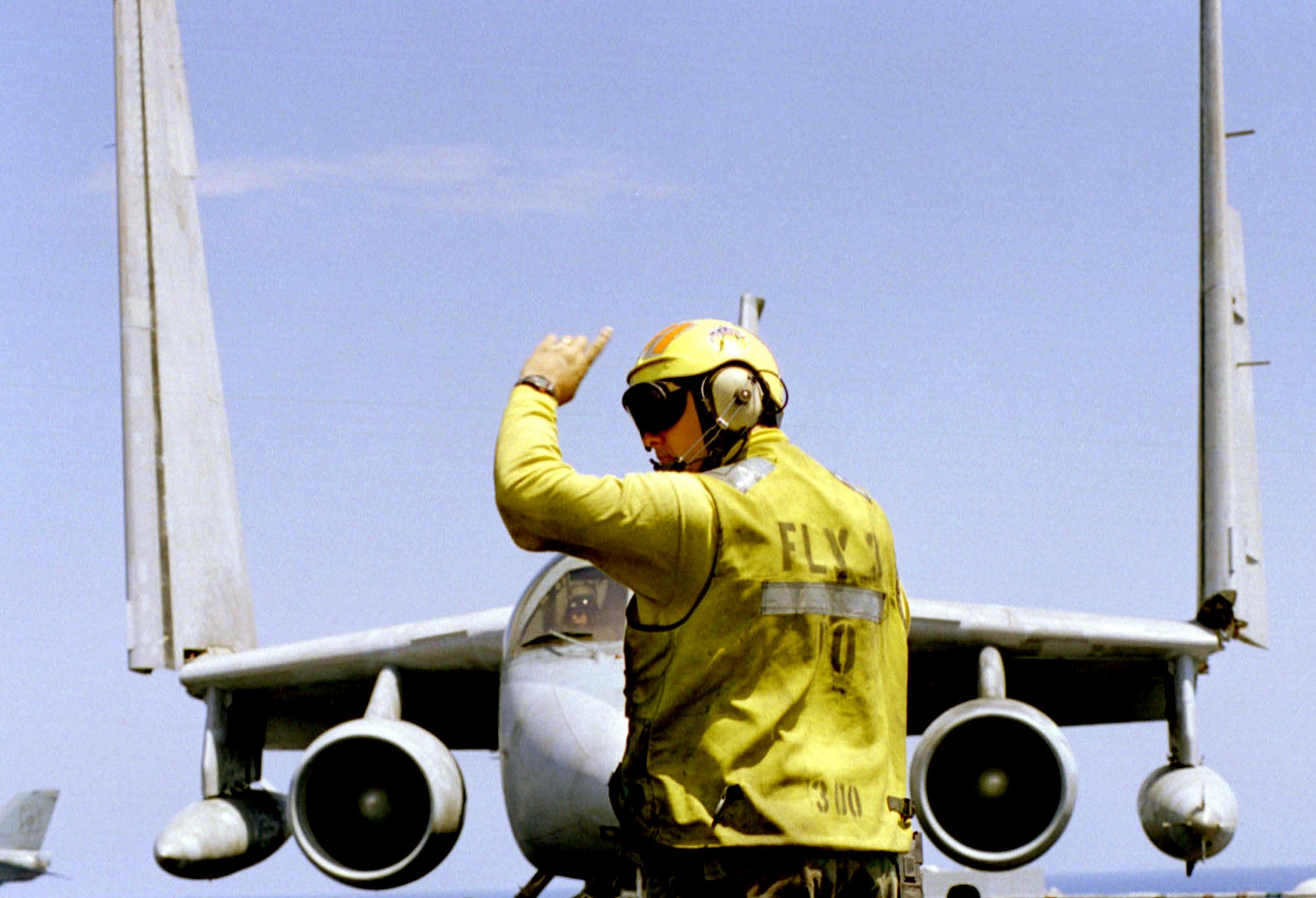 990505-N-7280M-006
	The Fly 3 Petty Officer directs an S-3B Viking as it folds its wings on the flight deck of the USS Theodore Roosevelt (CVN 71) on May 5, 1999, after completing a NATO Operation Allied Force mission.  Roosevelt and its embarked Carrier Air Wing 8 are operating in the Adriatic Sea in support of Operation Allied Force which is the air operation against targets in the Federal Republic of Yugoslavia.  The Viking is attached to Air Anti-Submarine Squadron 24, Naval Air Station Cecil Field, Fla.  DoD photo by Petty Officer 3rd Class Donne' McKissic, U.S. Navy.  (Released)