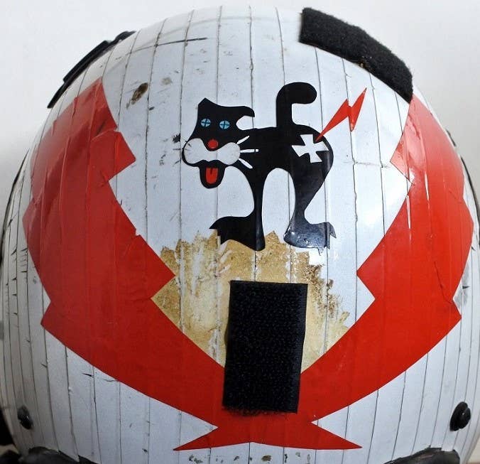 The Duty Cat adorned many flight-crew helmets in the 1980s — this is Gil Gregg’s. <em>Gil Greg</em>g