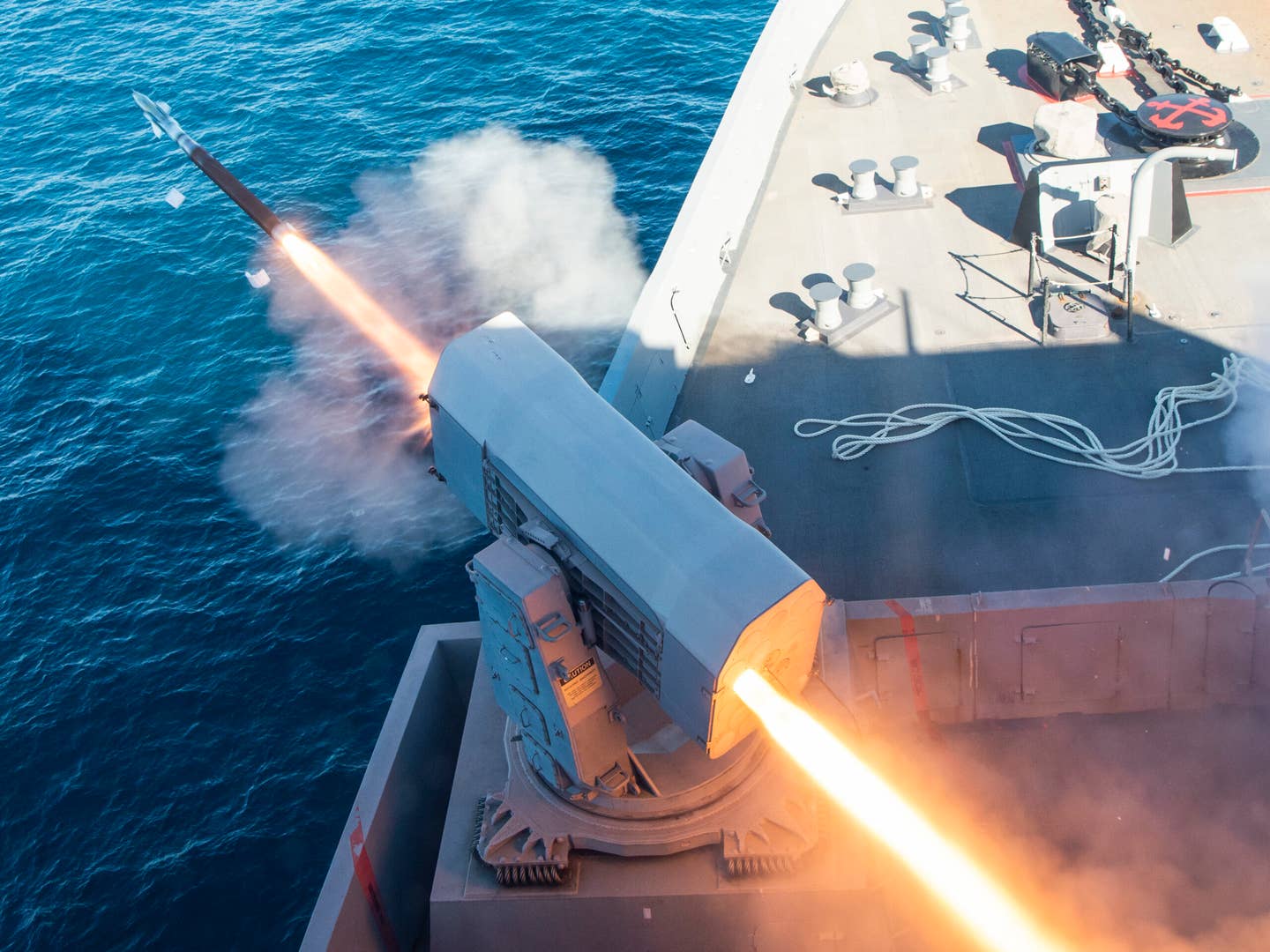 The amphibious transport dock ship USS <em>Anchorage</em> (LPD-23) fires a RIM-116 Rolling Airframe Missile (RAM) during a live-fire exercise in the Pacific Ocean earlier this year. <em>U.S. Navy Photo by Mass Communication Specialist 2nd Class Hector Carrera</em>