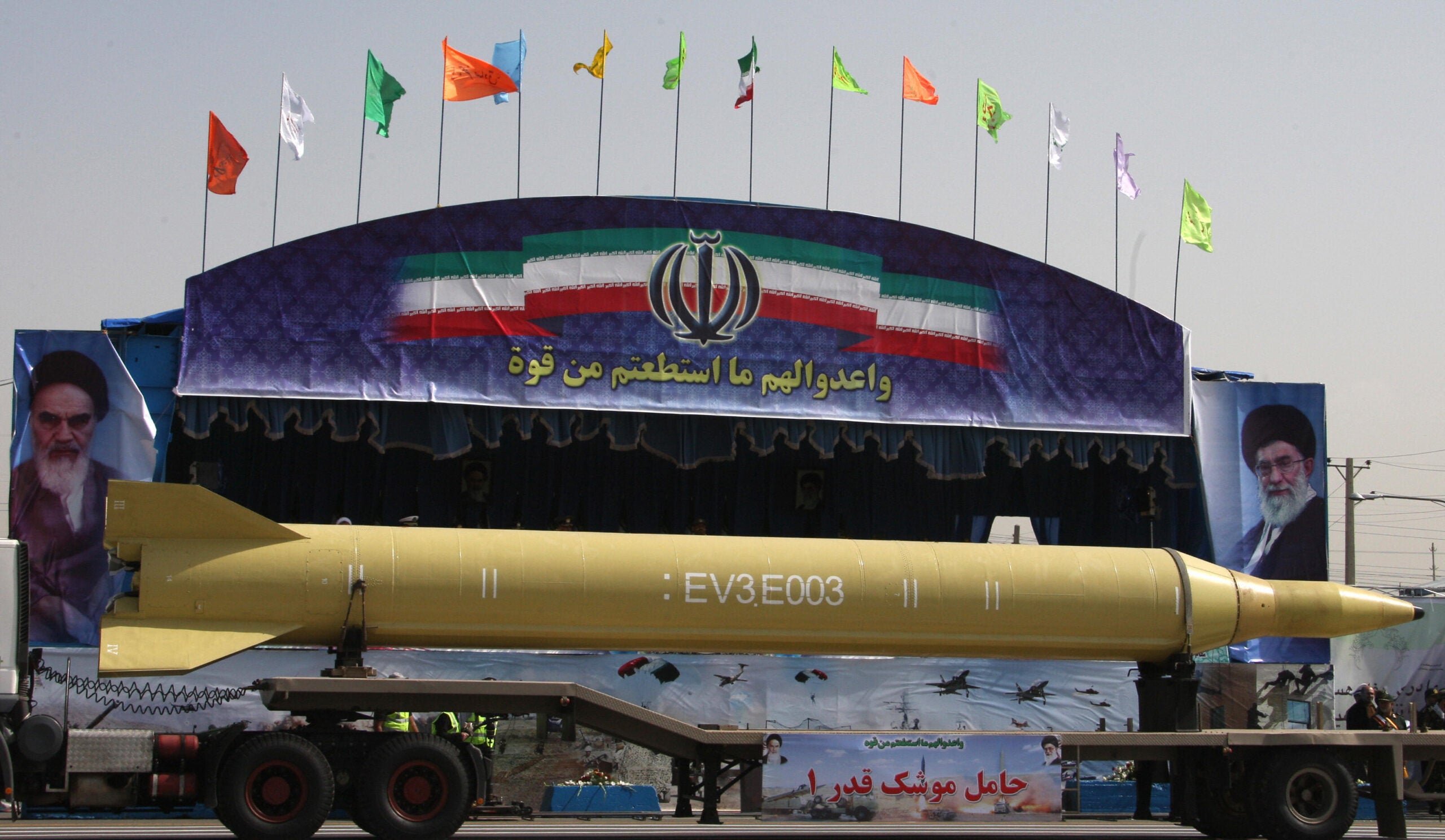 A military truck carries a long-range Ghadr-1 missile during an annual military parade which marks Iran's eight-year war with Iraq, in the capital Tehran on September 22, 2009. Iranian President Mahmud Ahmadinejad warned that Iran would confront any attack on the Islamic republic, addressing an army parade which was marred by the reported crash of a military plane. AFP PHOTO/ATTA KENARE (Photo credit should read ATTA KENARE/AFP via Getty Images)