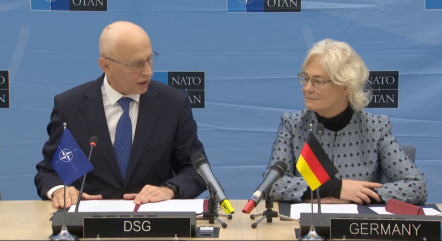 NATO Deputy Secretary General Mircea Geoană and German Defense Minister Christine Lambrecht discuss the European Sky Shield Initiative in Brussels on Thursday. (Screen shot via DVDSHUB)