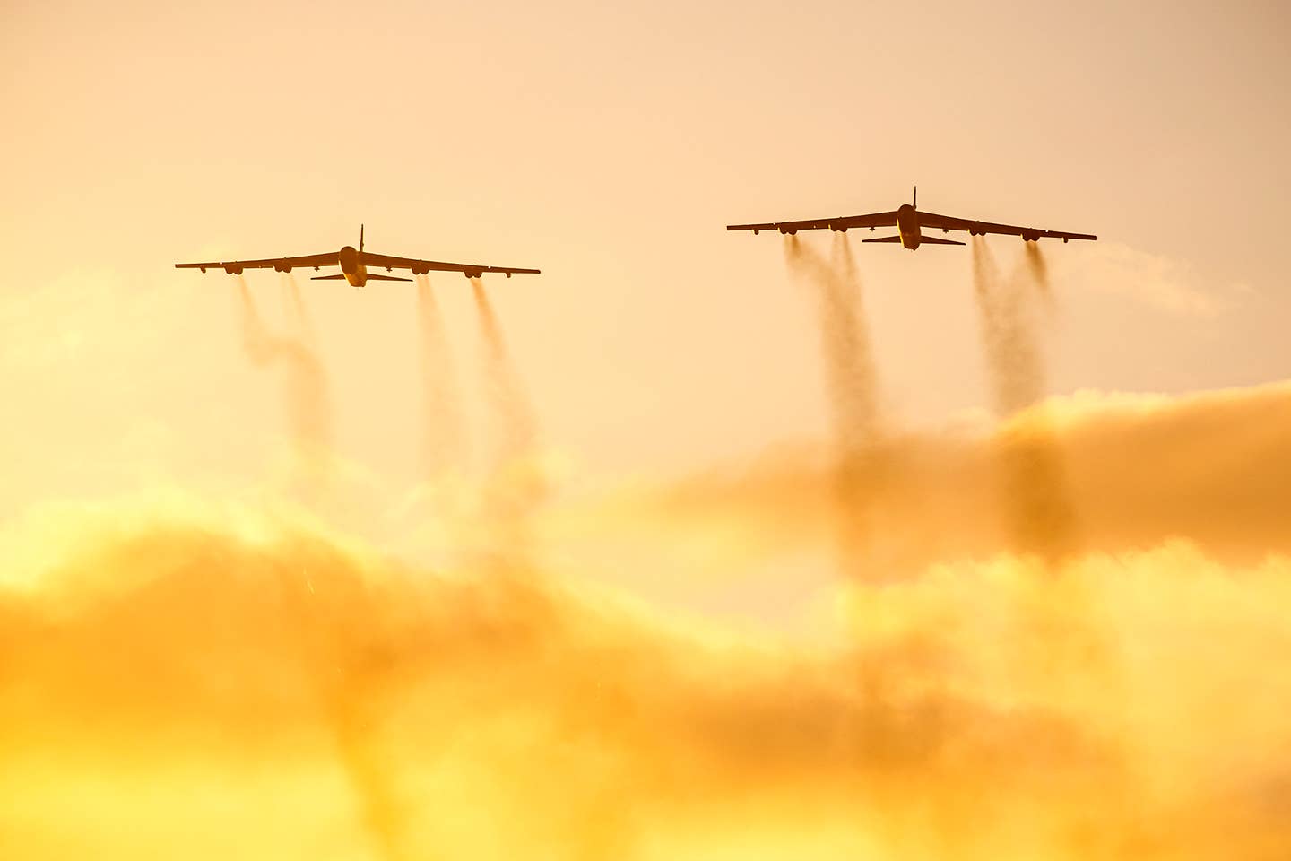 Two B-52 Stratofortressess fly overhead at RAF Fairford, England, on Aug. 22, 2020. Strategic bombers contribute to stability in the European theater as they are intended to deter conflict rather than instigate it. <em>Credit: U.S. Air Force photo by Senior Airman Eugene Oliver</em>