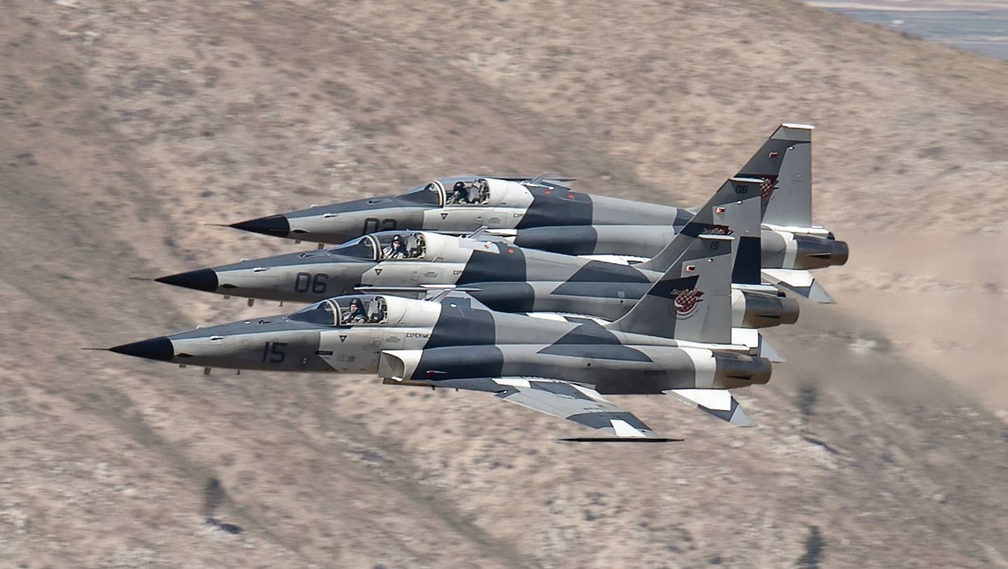Three of Tactical Air Support's F-5AT aggressor jets flying with their new TacIRSTs. <em>Credit: Tactical Air Support</em>