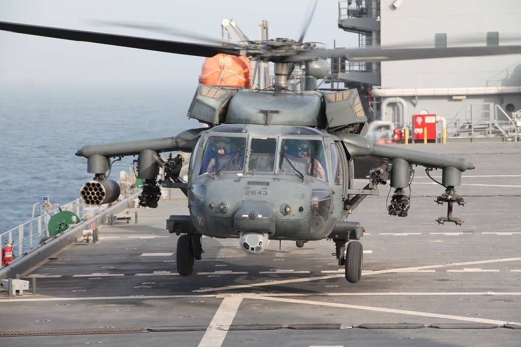 A UH-60M helicopter from the UAE Joint Aviation Command (JAC) lands aboard the expeditionary sea base USS <em>Lewis B. Puller</em> (ESB-3). <em>U.S. Navy photo by Chief Logistics Specialist Thomas Joyce</em>