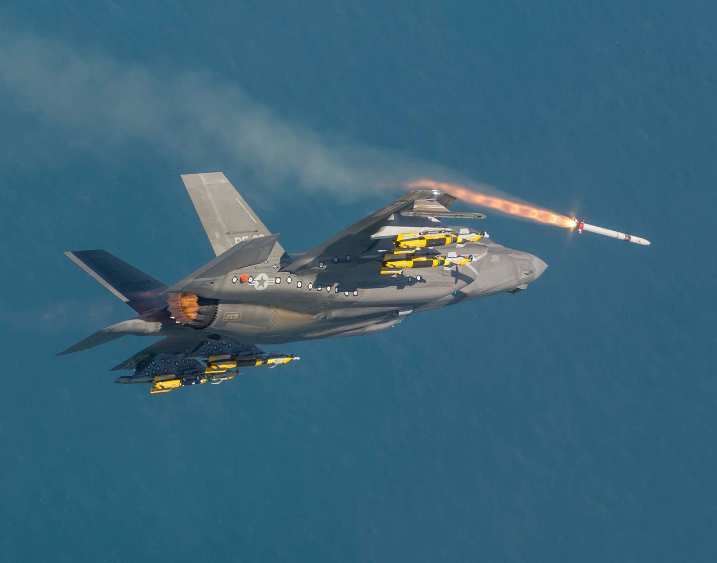 An F-35B from the test fleet fires an ASRAAM from the external pylon in 2017. <em>Lockheed Martin</em>