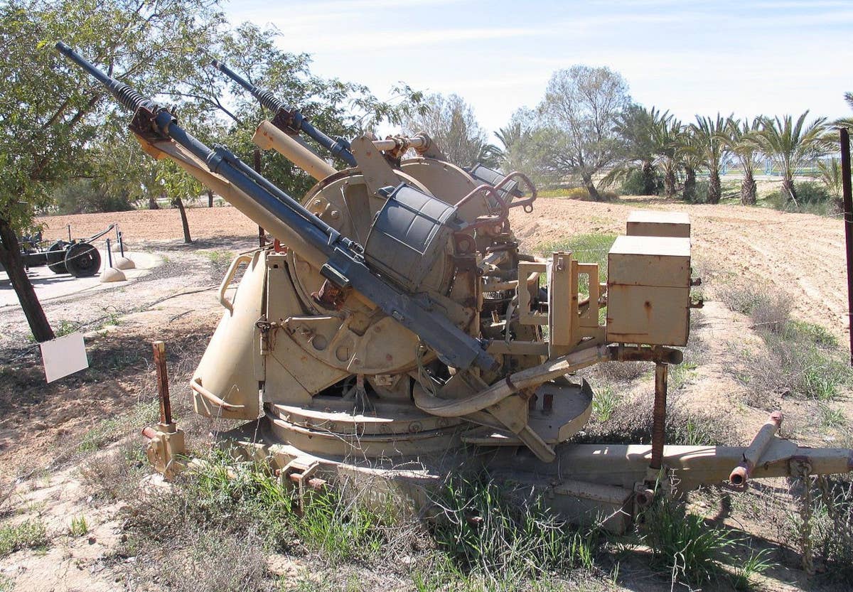 An Israel TCM-20, a modified M45 armed with two 20mm cannons, on display outdoors at a museum. <em>Bukvoed via Wikimedia</em>