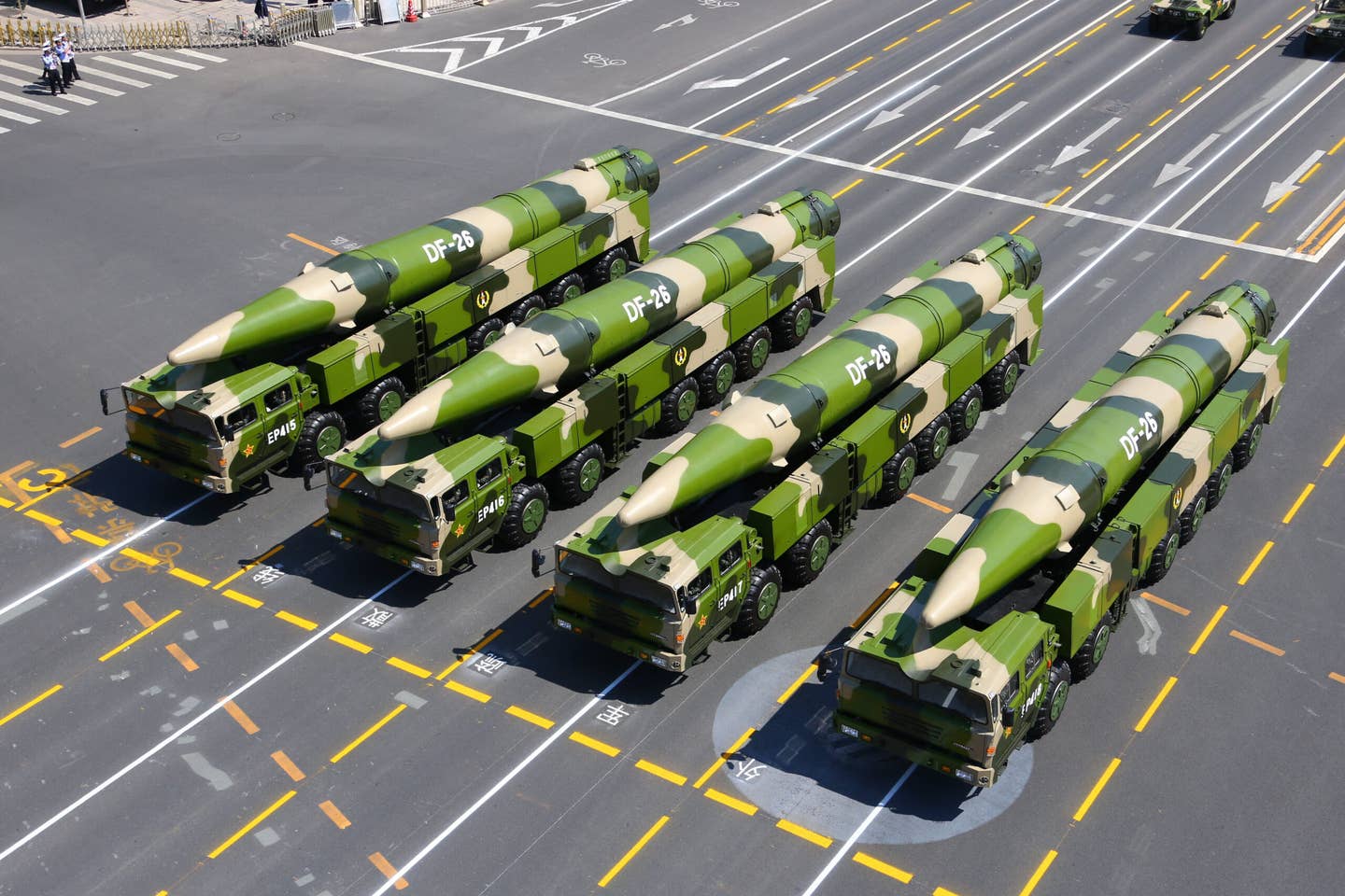 Chinese DF-26 intermediate-range ballistic missiles attend a military parade in Beijing. <em>Xinhua/Cha Chunming via Getty Images</em>