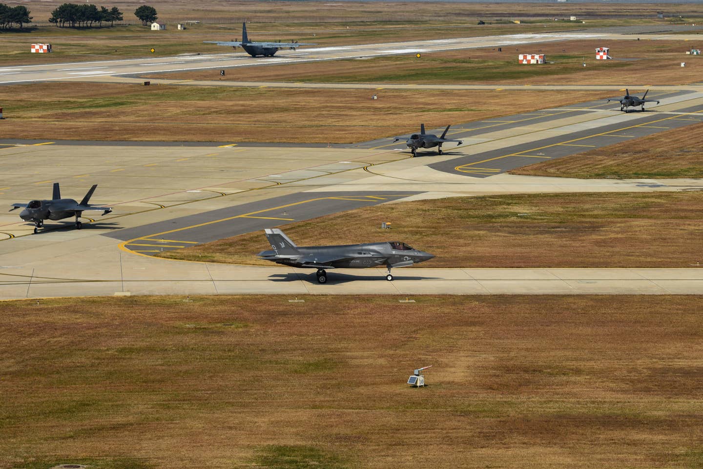 Four U.S. Marine Corps F-35B taxi down the flight line at Kunsan Air Base, South Korea, October 31, 2022. The aircraft traveled to Kunsan as a part of the Vigilant Storm training event. <em>U.S. Air Force photo by Tech. Sgt. Timothy Dischinat</em>