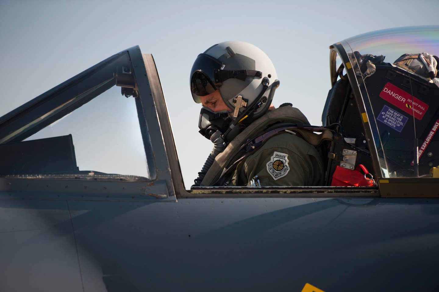 An Airborne Tactical Advantage Company pilot conducts a final instrument check in the cockpit of his Hunter. The ATAC Hunters are fitted with the Mk 3 ejection seat that was first used in 1955. <em>U.S. Air Force photo by Senior Airman Armando A. Schwier-Morales/Released</em>