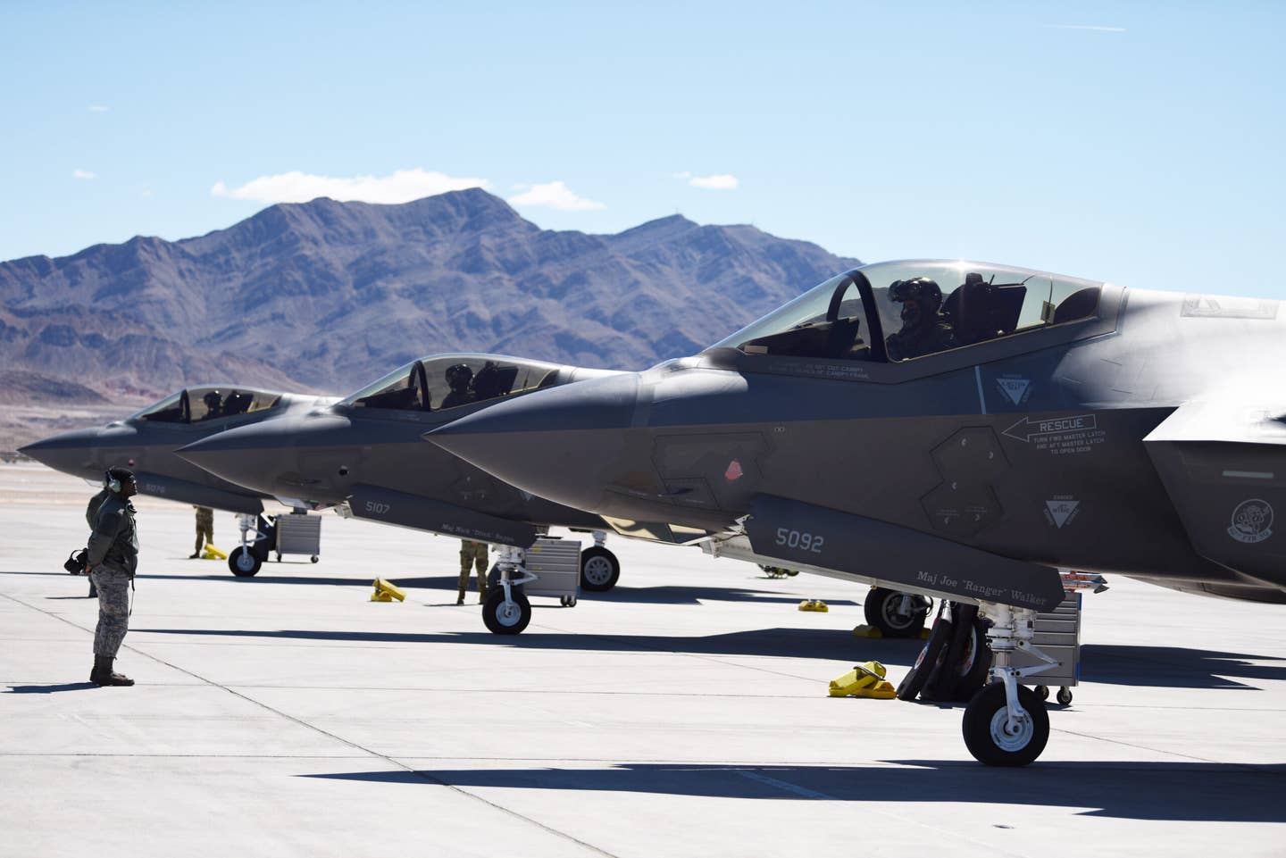 Three F-35As assigned to the 62nd Fighter Squadron at Luke Air Force Base, Arizona, lined up and ready to take off on a mission. <em>U.S. Air Force</em>