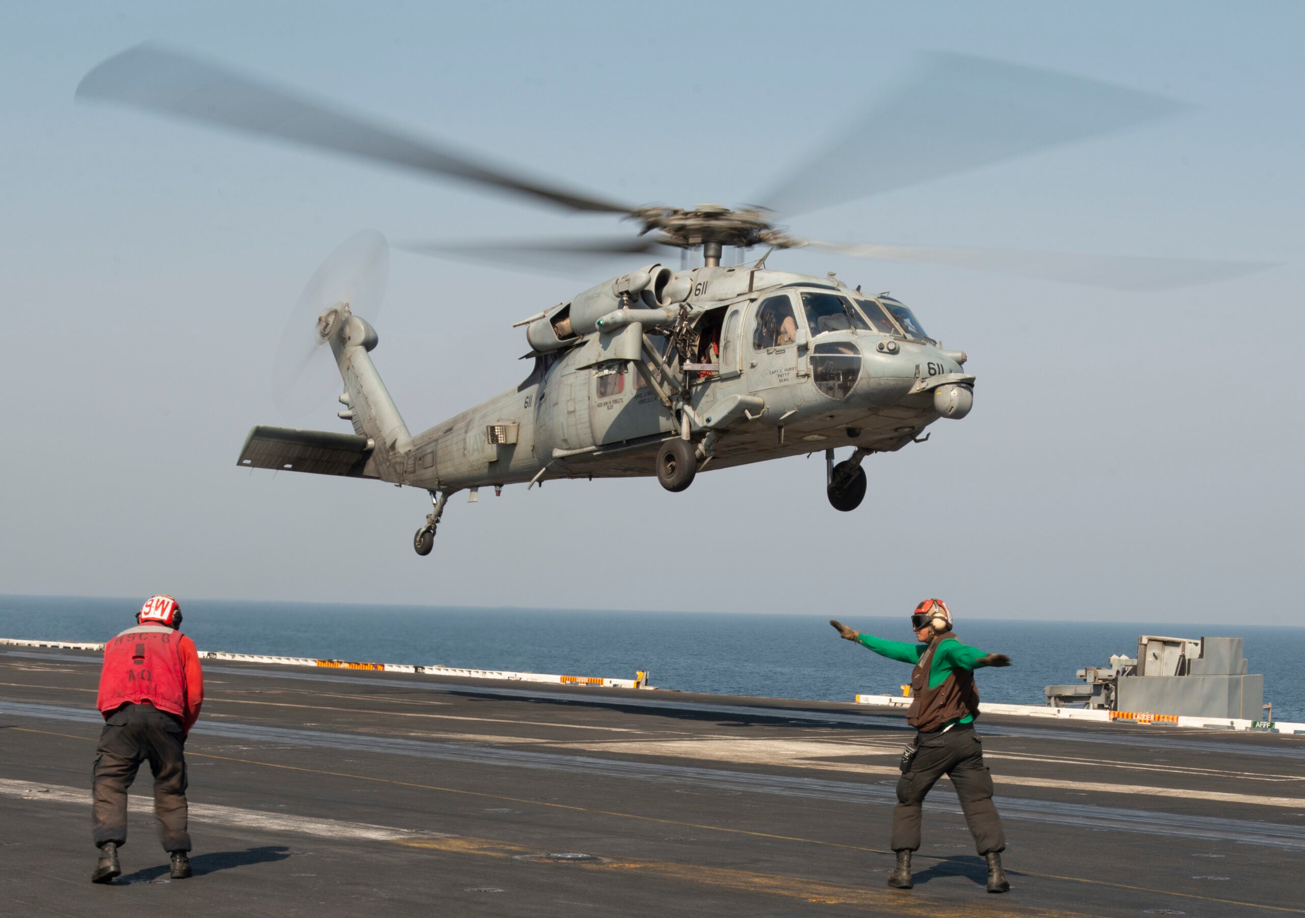 ARABIAN GULF (Oct. 28, 2020) An MH-60S Sea Hawk helicopter, from the "Screamin' Indians" of Helicopter Sea Combat Squadron (HSC) 6, lifts off the flight deck of the aircraft carrier USS Nimitz (CVN 68). Nimitz, the flagship of Nimitz Carrier Strike Group, is deployed to the U.S. 5th Fleet area of operations, conducting missions in support of Operation Inherent Resolve, and maritime security operations alongside regional and coalition partners. (U.S. Navy photo by Mass Communication Seaman Bryant Lang)