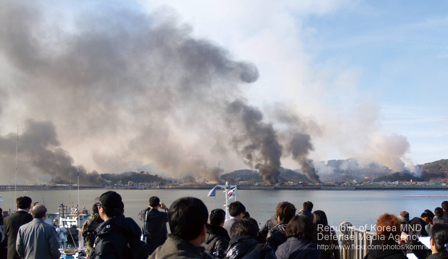 Fires on Yeongpyeongdo after the island was hit by North Korean artillery shells in November 2010. <em>Republic of Korea Armed Forces</em>
