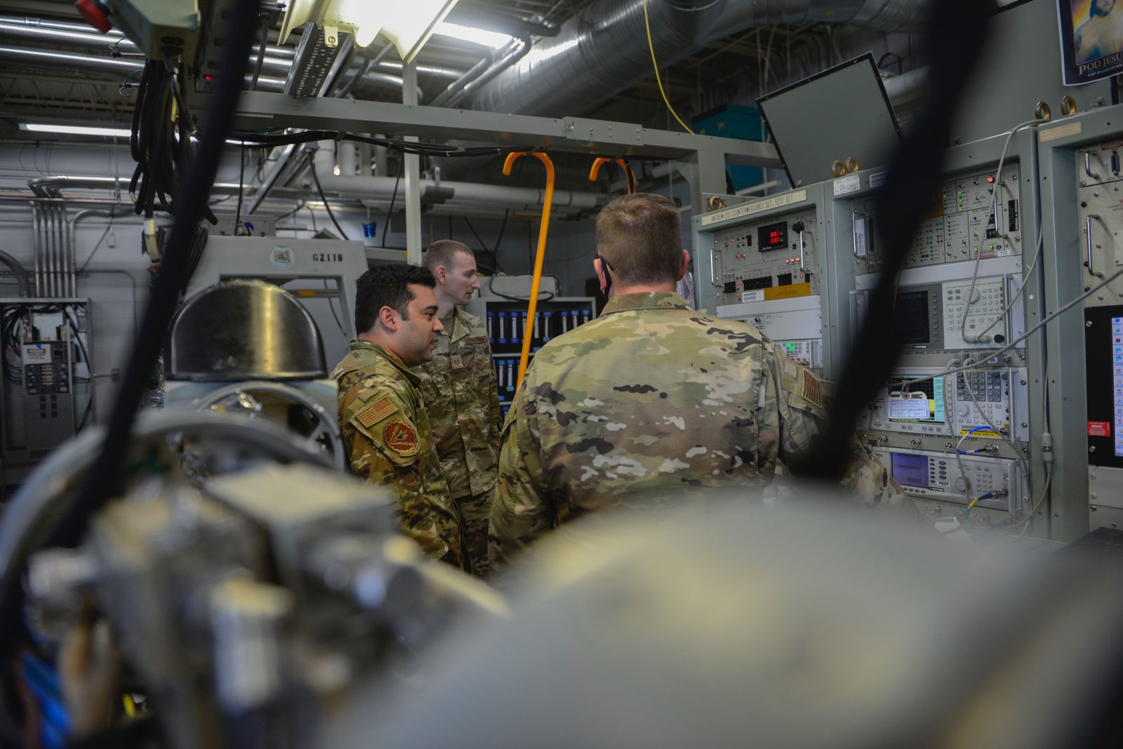 Airmen from the 36th Electronic Warfare Squadron calibrate automatic support equipment at Eglin Air Force Base, Florida, August 29, 2022. The 36th EWS provides missionized software for jamming and detection systems to ensure aircraft survivability. <em>Credit: U.S. Air Force photo by Staff Sgt. Ericka A. Woolever</em>