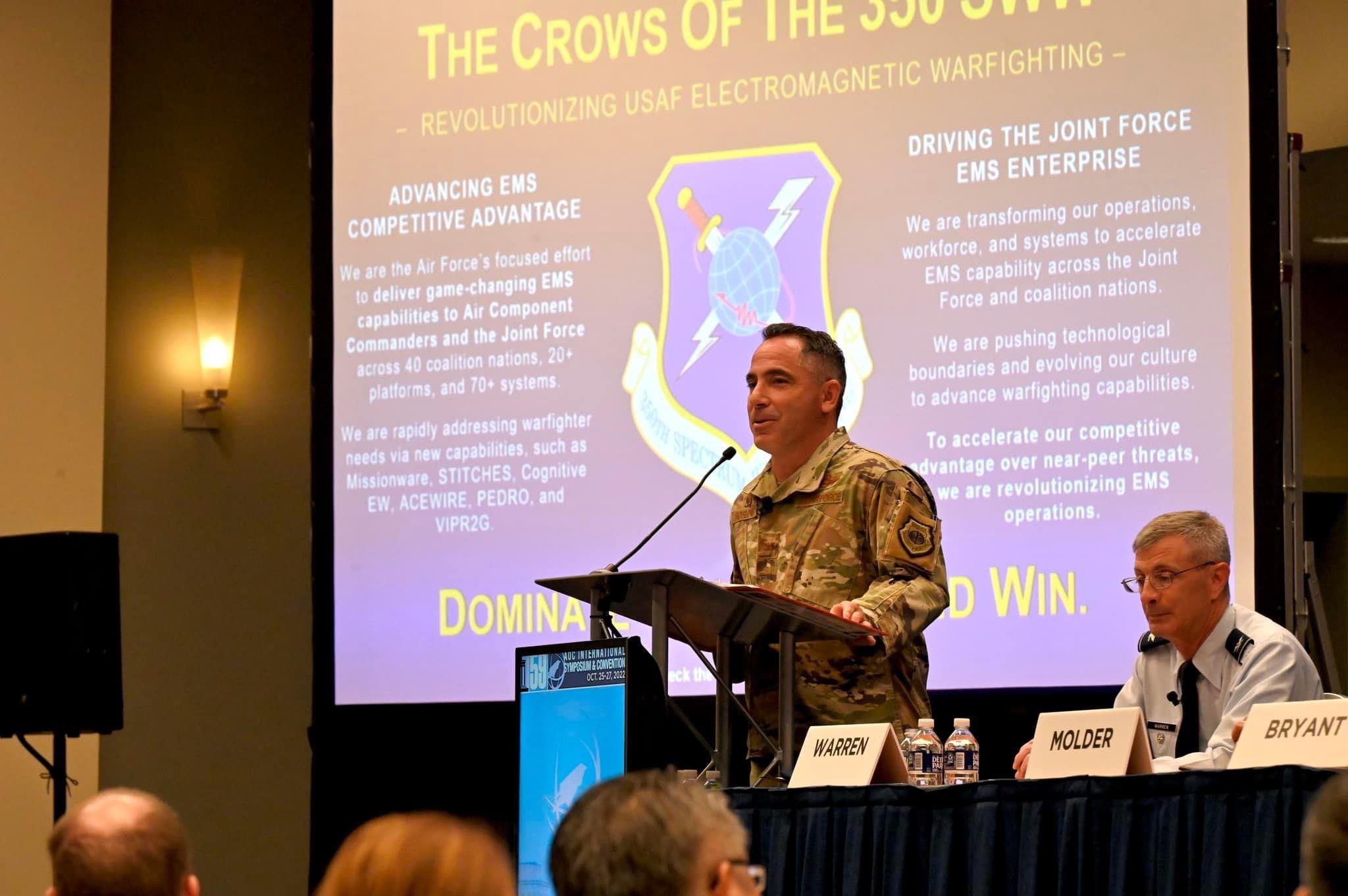 U.S. Air Force Col Josh Koslov, 350th Spectrum Warfare commander, briefs about the wing’s mission during a panel discussion at the Association of Old Crows (AOC) at the 59th Annual AOC International Symposium &amp; Conference, Washington D.C., Oct. 26, 2022. <em>Credit: U.S. Air Force photo by 1st Lt. Benjamin Aronson</em>