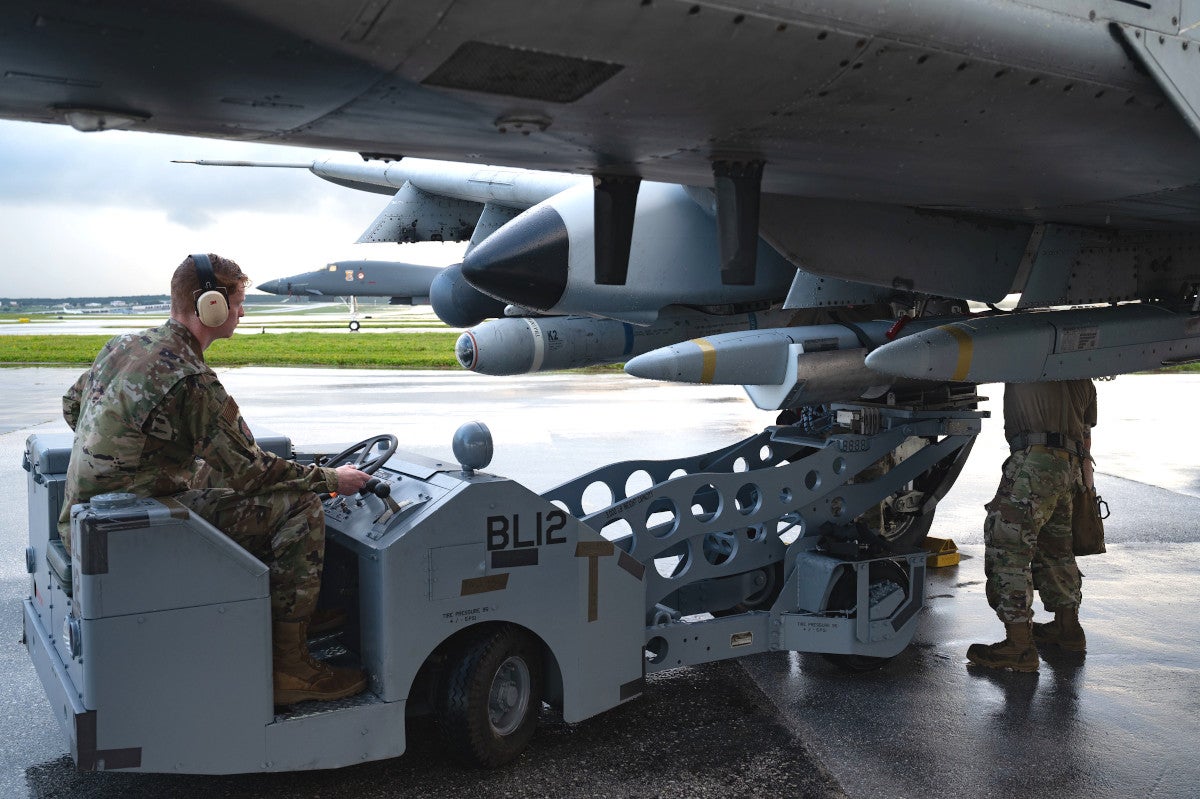 A 74th Fighter Generation Squadron load crew equips an A-10C Thunderbolt II with a Miniature Air-Launched Decoy craft at Andersen Air Force Base, Guam, Nov. 4, 2022. The MALD was designed to negate enemy air defense systems and enable previously vulnerable aircraft to operate in heavily contested operating environments. (U.S. Air Force photo by Staff Sgt. Hannah Malone)