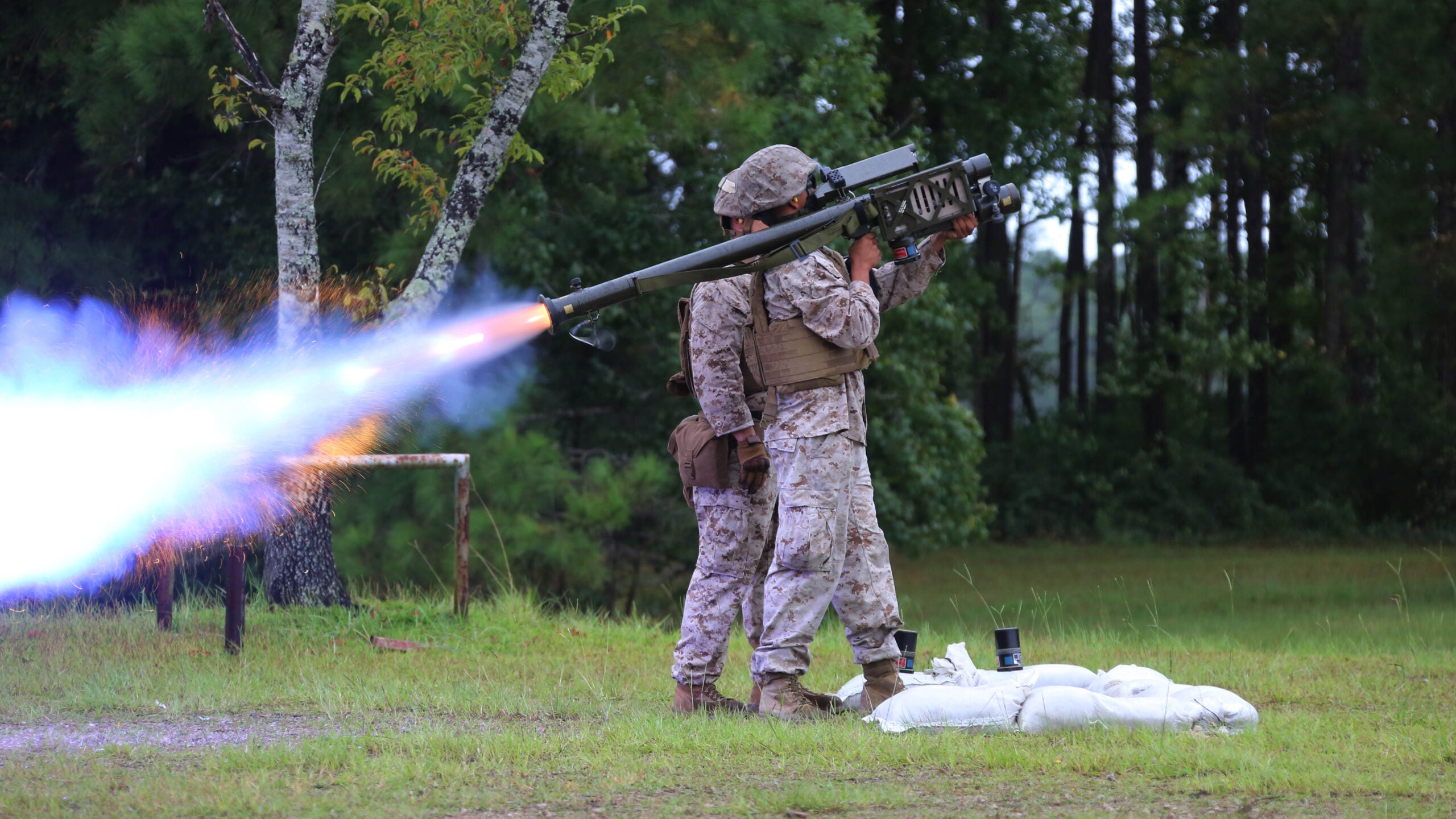 A Marine fires an FIM-92 Stinger Missile at a target during a stinger simulation training range at Marine Corps Air Station Cherry Point, N.C., Sept. 24, 2015. Marines with 2nd Low Altitude Air Defense Battalion sharpened their proficiency skills by simulating the weight transfer felt when firing the 34.2 pound missile. The weapon is a personal and portable infrared, homing, surface-to-air missile capable of tracking and engaging aircraft up to an altitude of 10,000 feet and covering distances up to eight kilometers. 2nd LAAD utilizes the stinger missile to provide ground-to-air defense to the 2nd Marine Aircraft Wing and Marine Air-Ground Task Force elements.