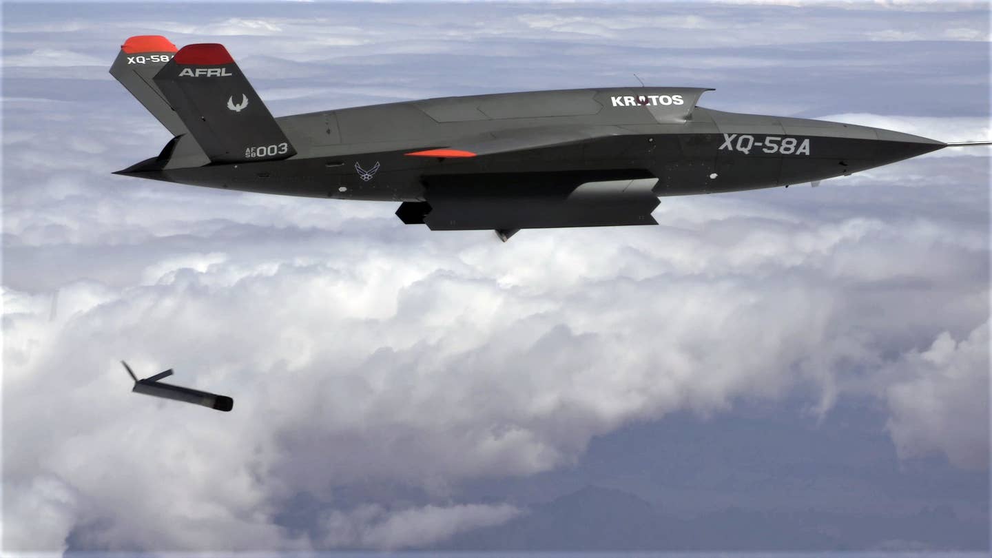 The XQ-58A Valkyrie demonstrates the separation of the <a href="https://www.twz.com/our-first-look-at-an-altius-600m-loitering-munition-detonating">ALTIUS-600</a> small unmanned aircraft system in a test at the U.S. Army Yuma Proving Ground test range, Arizona, March 26, 2021. <em>U.S. Air Force courtesy photo</em>