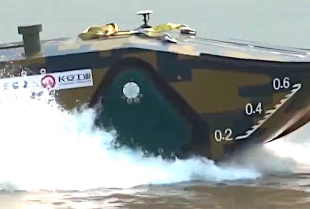 The vehicle's front right track is seen in the 'stowed' position in this shot. <em>Screen capture via Twitter/Chinese Internet</em>