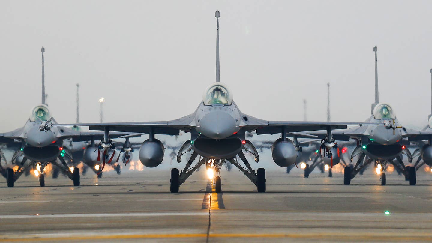 ROCAF F-16s taxi on the runway at Chiayi Air Base, during a Taiwanese military drill ahead of the Chinese New Year, on January 5, 2022. <em>Photo by Ceng Shou Yi/NurPhoto via Getty Images</em>