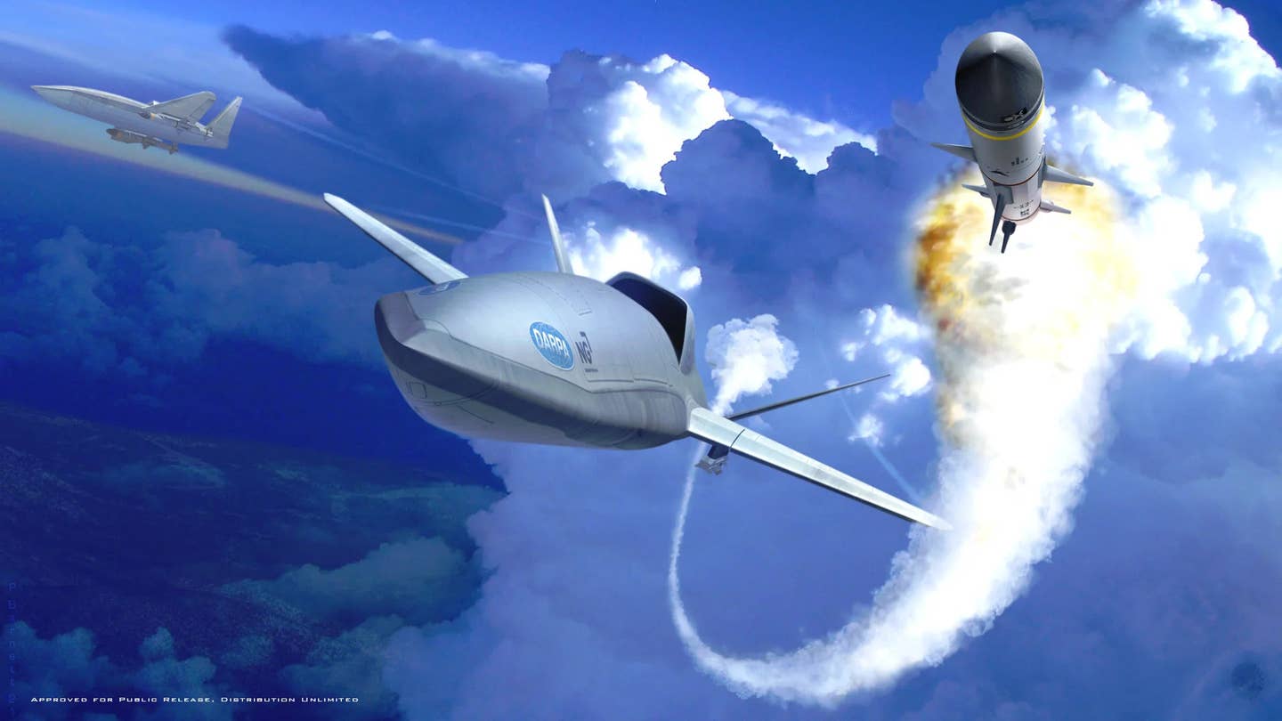 Concept art showing a drone firing a missile. This is something the Air Force says will require the explicit involvement of a human operator for the foreseeable future. <em>Northrop Grumman</em>
