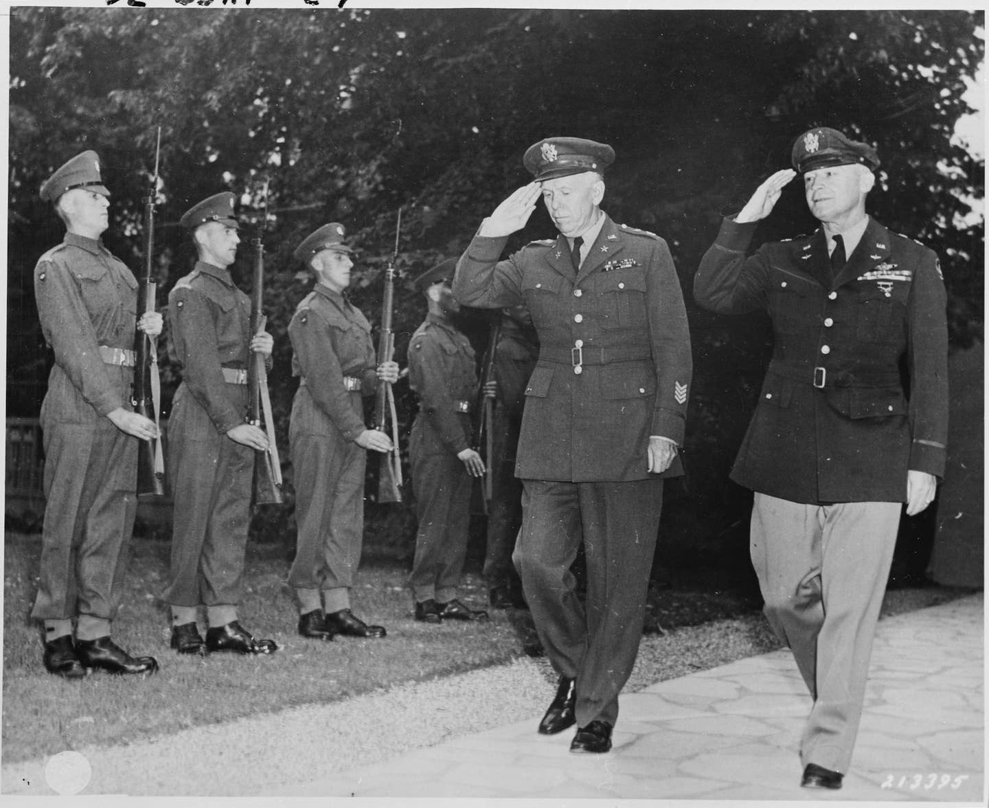 Gen. George C. Marshall (L), U. S. Army Chief of Staff, and Gen. Henry "Hap" Arnold (R), Commanding General, U. S. Army Air Forces, arrive at the residence of Prime Minister Winston Churchill for a dinner given by the British Prime Minister for President Truman and Soviet leader Josef Stalin during the Potsdam Conference, July 23, 1945.&nbsp;<em>Unknown author/Wikimedia Commons.</em>