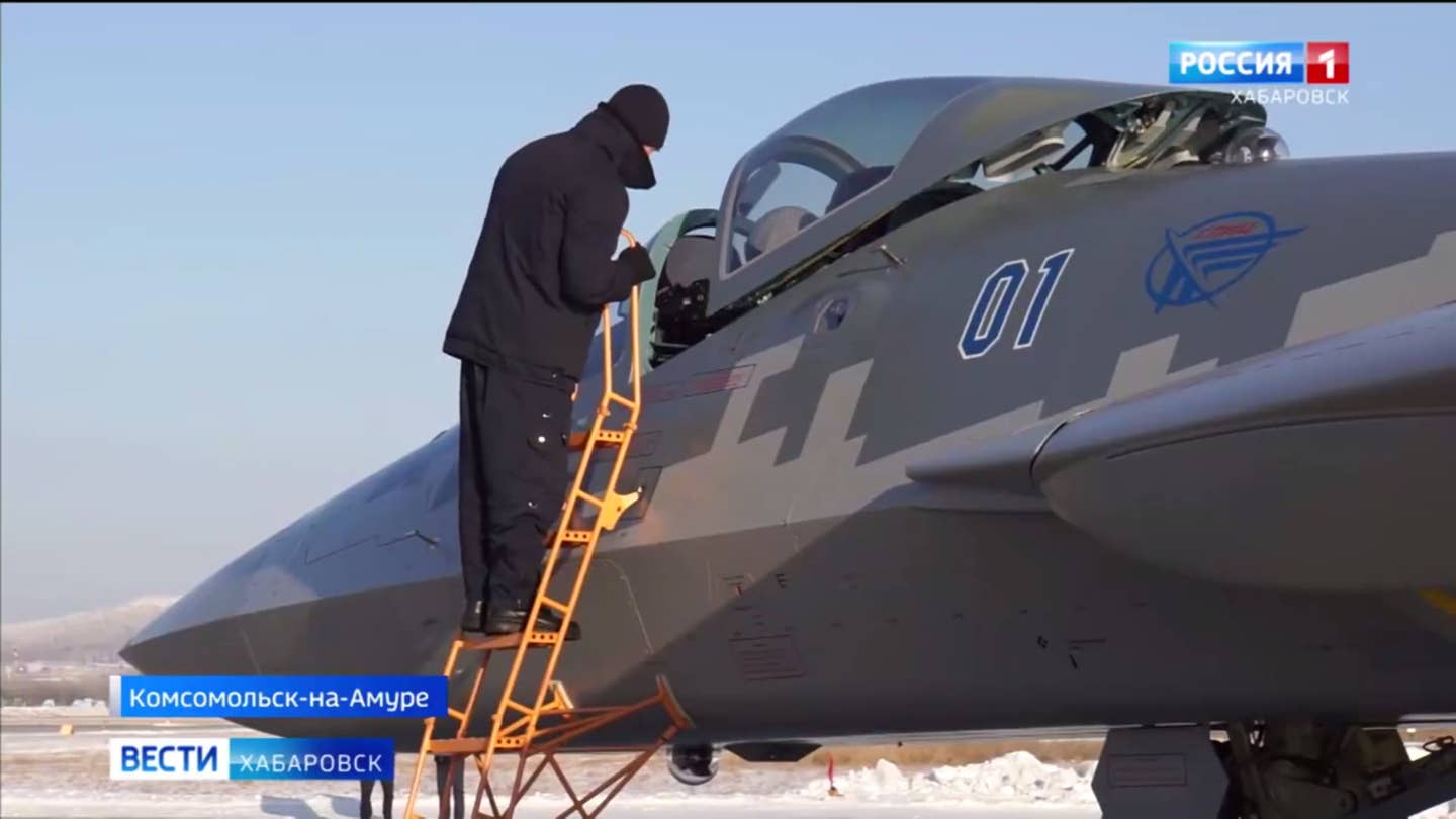 A Su-57 is prepared for the delivery flight from Komsomolsk-on-Amur to Akhtubinsk. <em>Russia 1 TV</em>