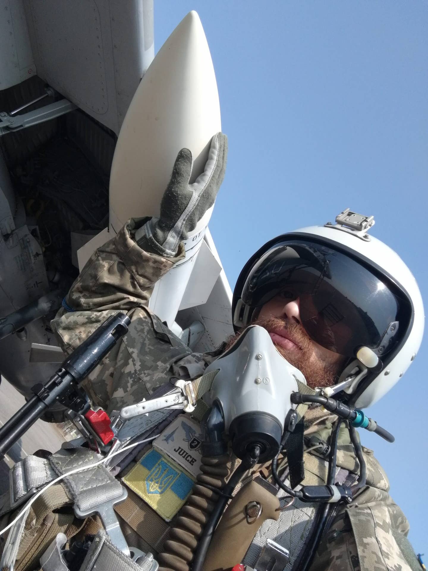 Juice poses alongside his MiG-29, armed for an air defense mission.&nbsp;<em>Juice/Ukrainian Air Force</em>