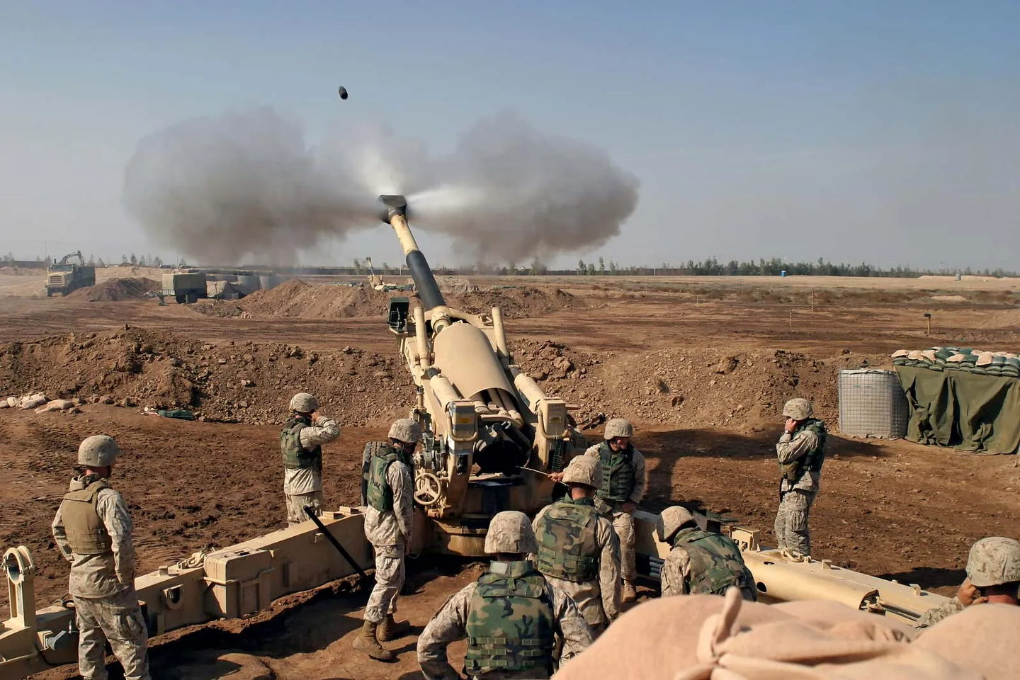 An&nbsp;M-198 155mm Howitzer&nbsp;of the U.S. Marines firing at&nbsp;Fallujah, Iraq, during the&nbsp;Second&nbsp;Battle of Fallujah in November 2004. <em>Credit:</em> <em>Lance Corporal Samantha L. Jones/U.S. Marine Corps</em>