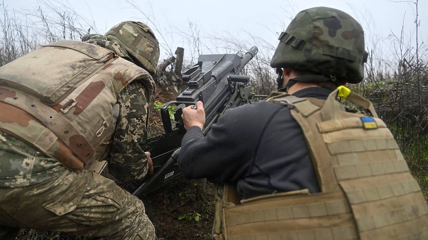 Ukrainian servicemen prepare a US-made MK-19 automatic grenade launcher towards Russian positions on the frontline in eastern Ukraine on December 17, 2022, amid the Russian invasion of Ukraine. (Photo by Genya SAVILOV / AFP) (Photo by GENYA SAVILOV/AFP via Getty Images)