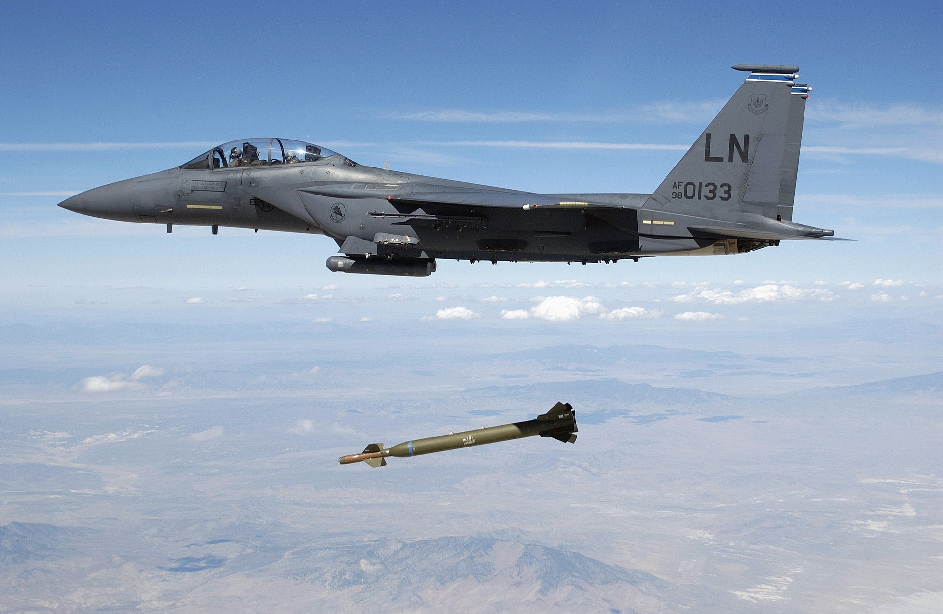 A US Air Force (USAF) F-15E Strike Eagle aircraft from the 492nd Fighter Squadron, Royal Air Force (RAF) Lakenheath, United Kingdom (UK) releases a GBU-28 "Bunker Buster" 5,000-pound Laser-Guided Bomb over the Utah Test and Training Range during a weapons evaluation test hosted by the 86th Fighter Weapons Squadron (FWS) from Eglin AFB, Florida (FL).